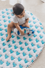 Baby playing on blue elephant hand block printed cotton playmat