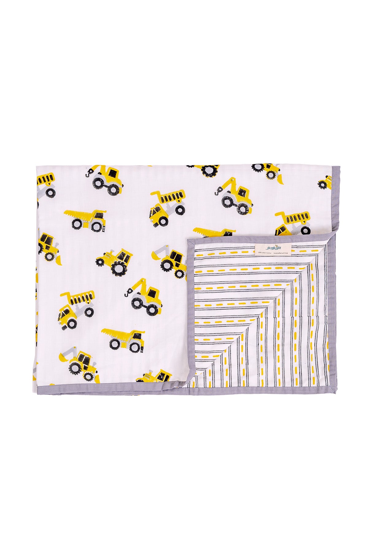 Folded construction truck print mulmul dohar with corner flipped to show striped reverse and Bumblebee label