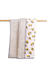 Reversible construction truck print mulmul quilt with striped back, hand block printed in yellow and grey