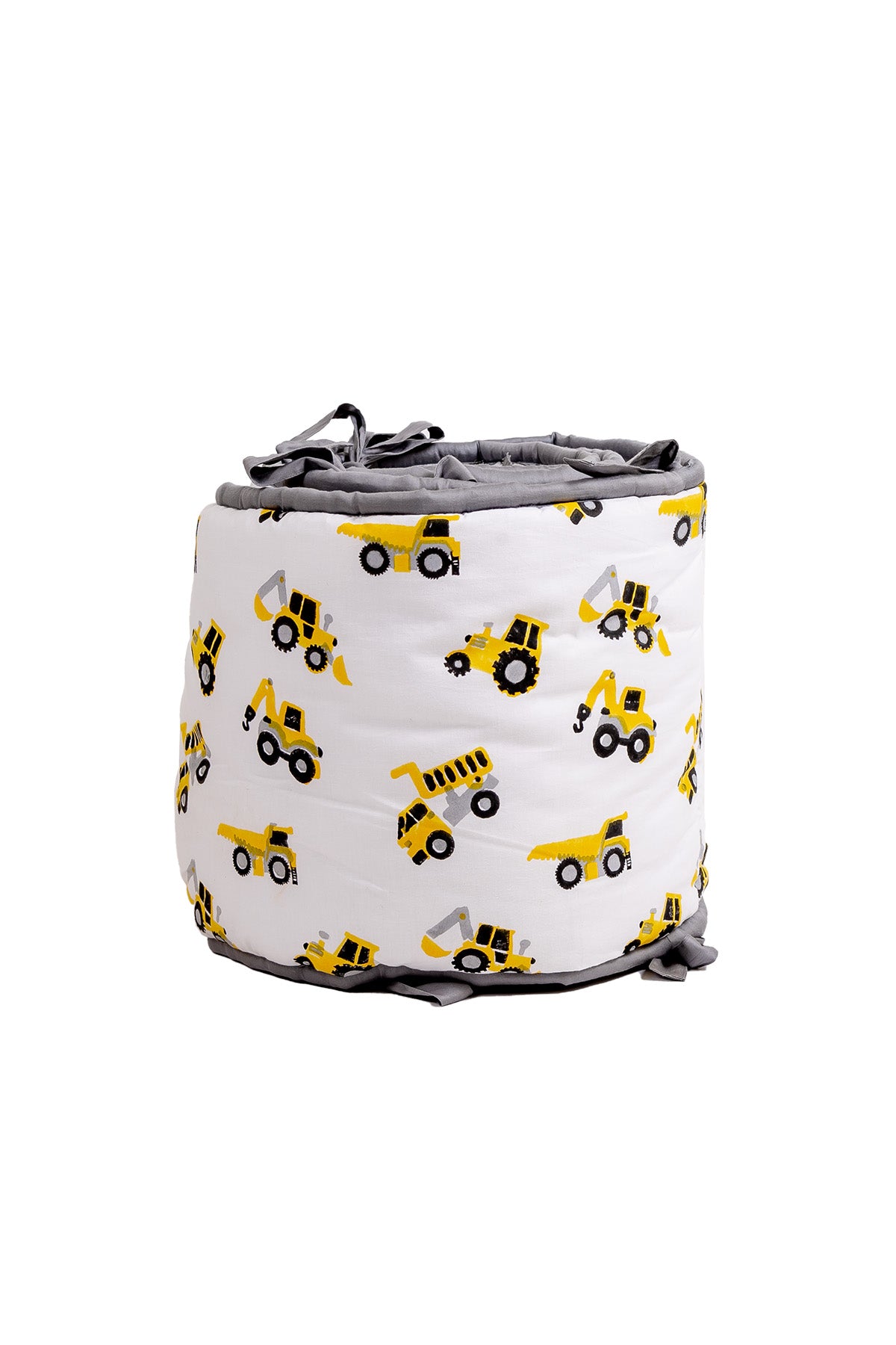 Rolled hand block printed cotton cot bumper with yellow construction truck print and grey piping