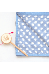 Close-up of dinosaurs hand block printed on soft cotton mulmul dohar
