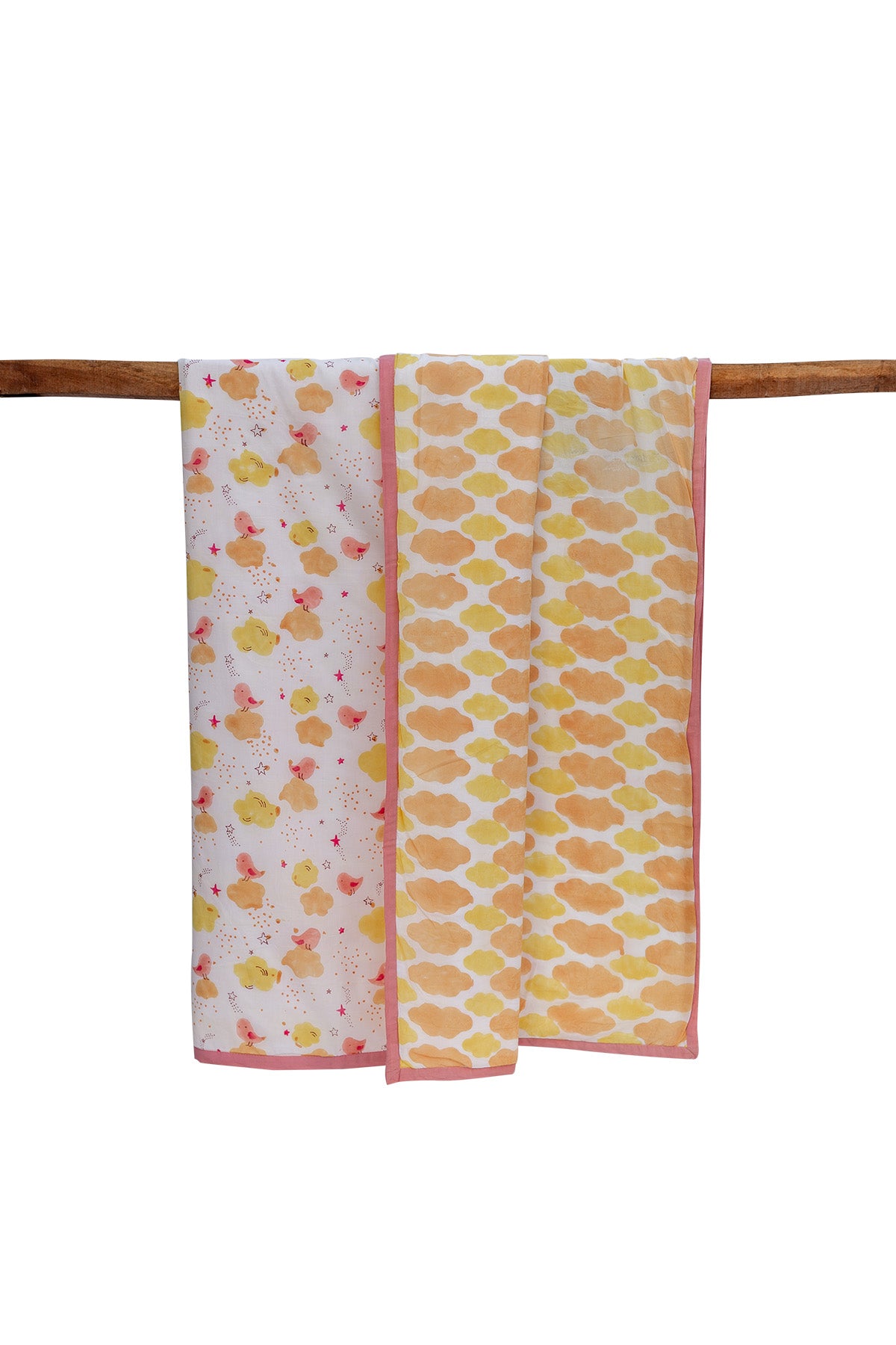 Reversible chirpy birds print cotton mulmul dohar showing the front and reverse sides