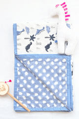 Reversible dinosaur print cotton mulmul dohar showing the front and reverse sides