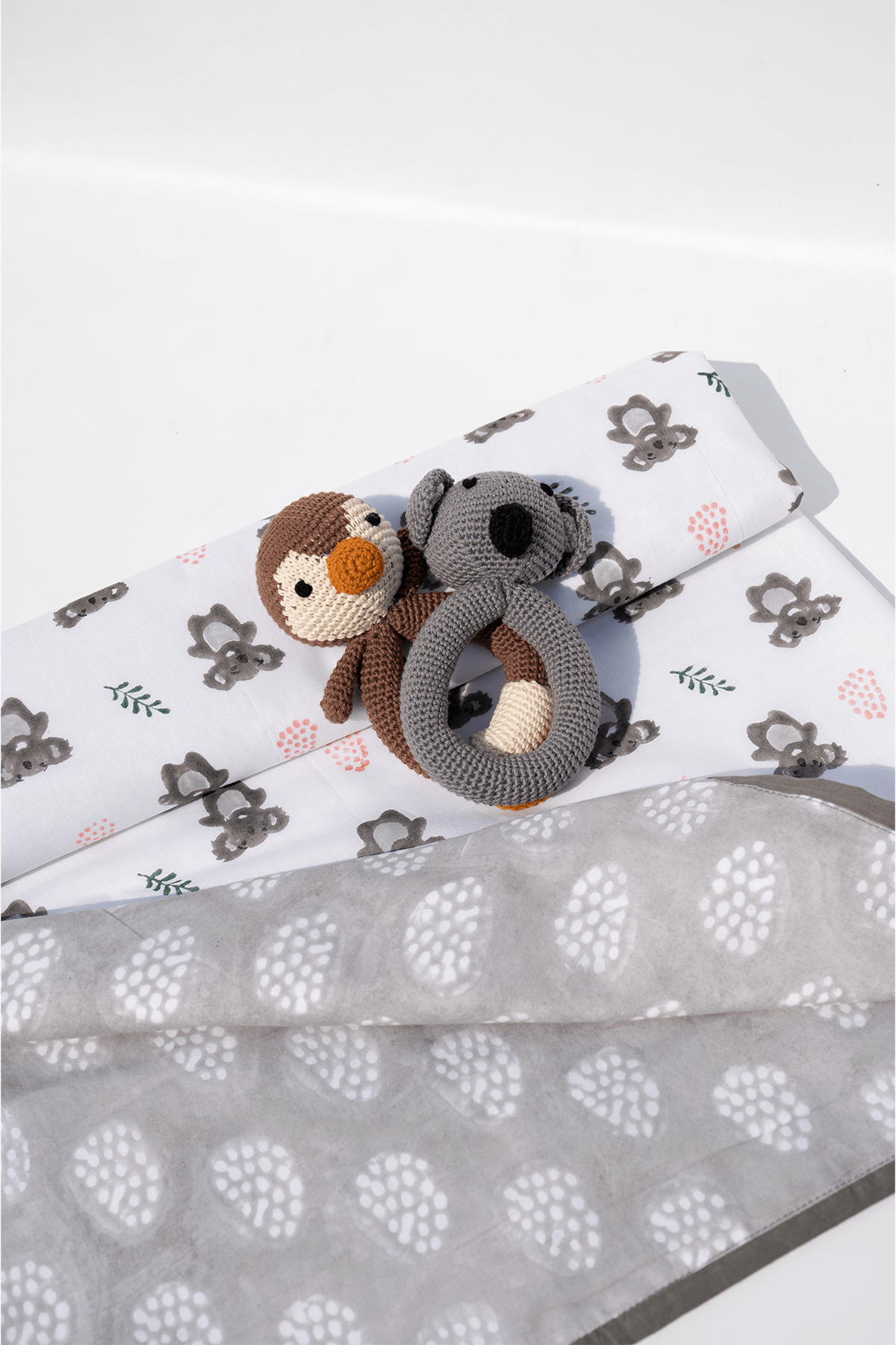 Reversible koala print cotton mulmul dohar showing the front and reverse sides