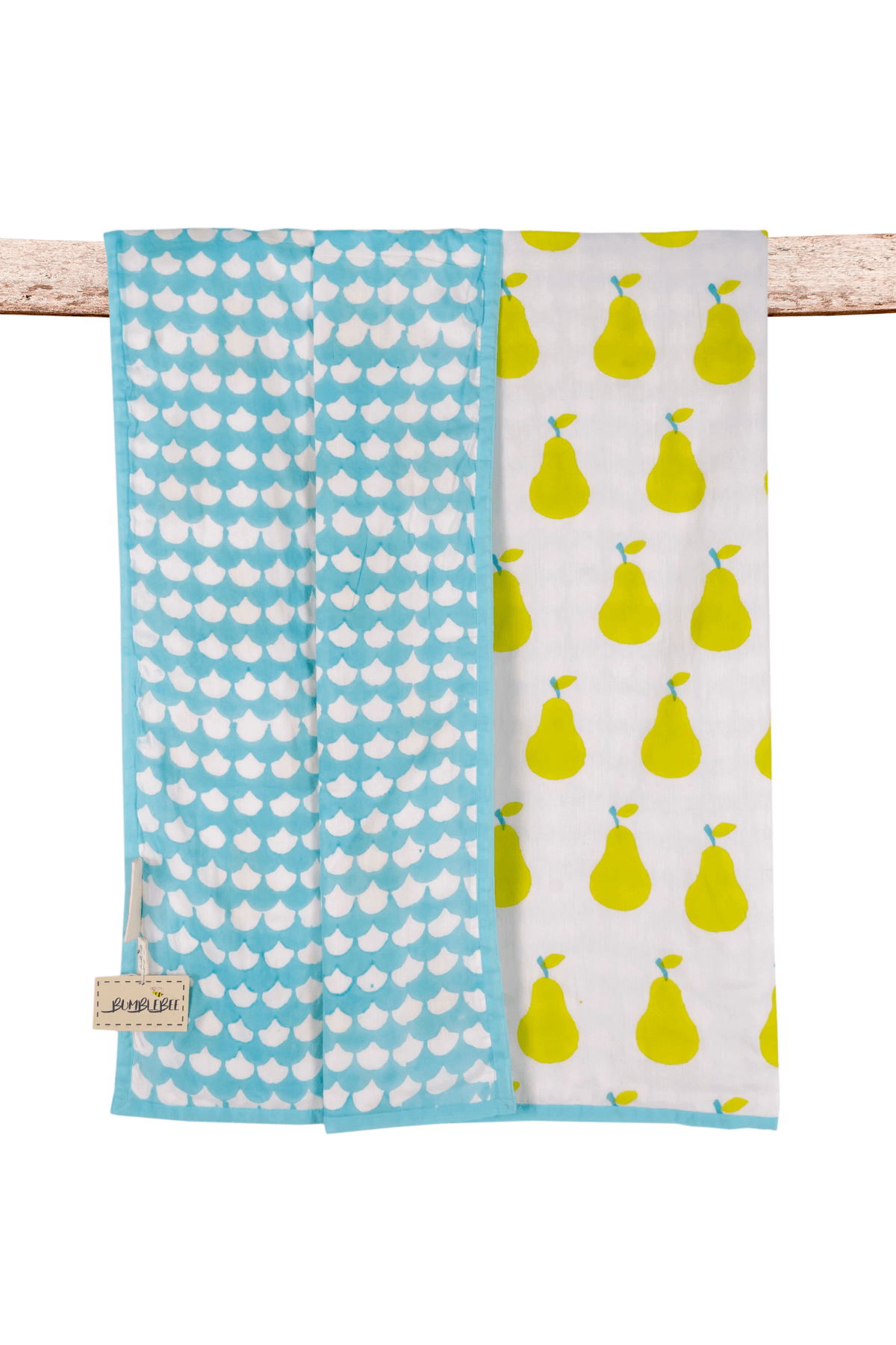 Reversible yellow pear hand block printed cotton mulmul dohar for kids, showing the pear print and reverse side